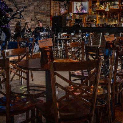 Interior, seating details, tables and chairs.