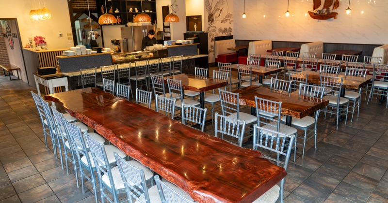 Interior, seating area with tables and chairs