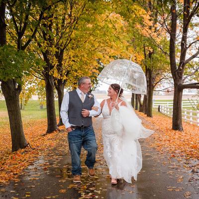 Wedding Couple on the Driveway at Next Chapter Winery in the Fall.