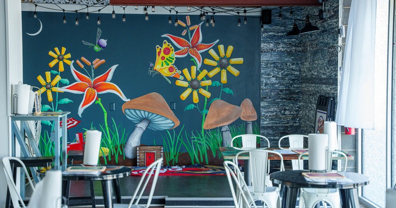 Interior, chairs and tables, decorated wall