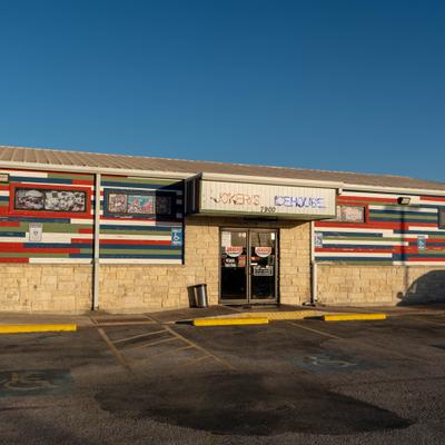 Exterior, view of the restaurant and parking lot.