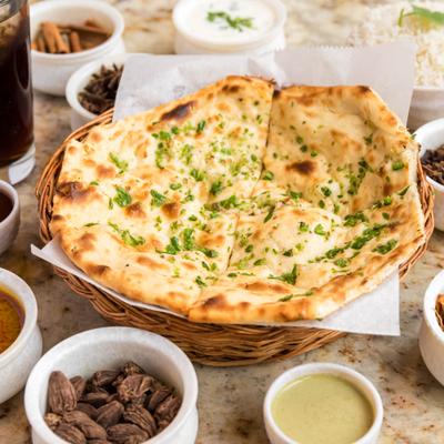 Garlic naan, served.