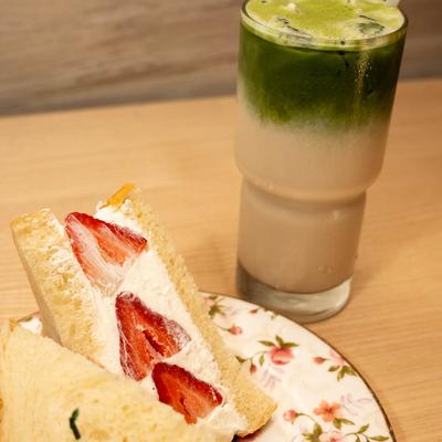 Fruit sando with a glass of Matcha milk tea.