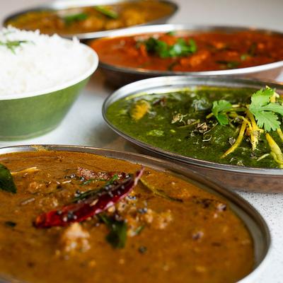 Assorted curry dishes.