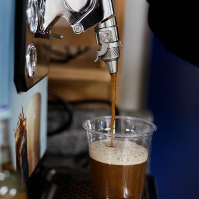 Coffee being poured from the dispensary.