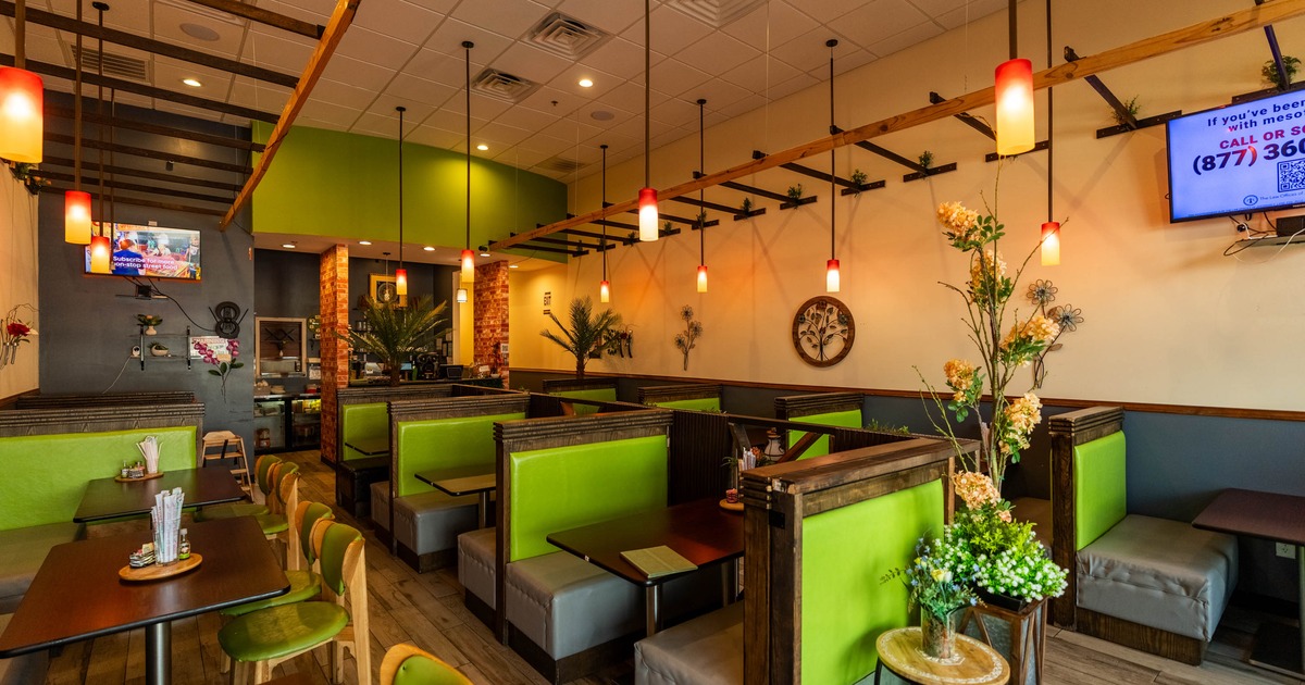 Interior, seating area with booths, tables and chairs