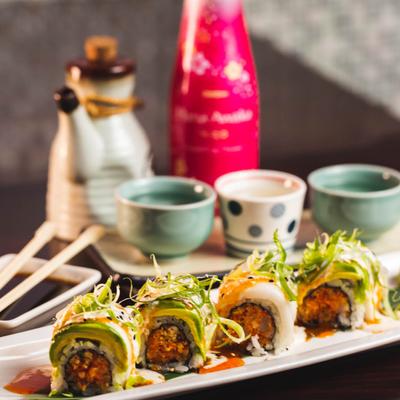 Scallop rolls, with caviar, white tuna, avocado, scallions and sweet chili sauce