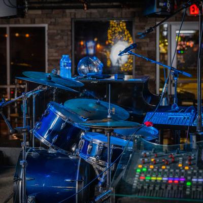 Interior details, music gear on a stage.