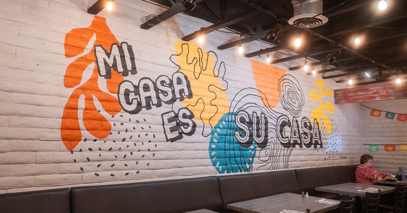 Dining area with a wall mural