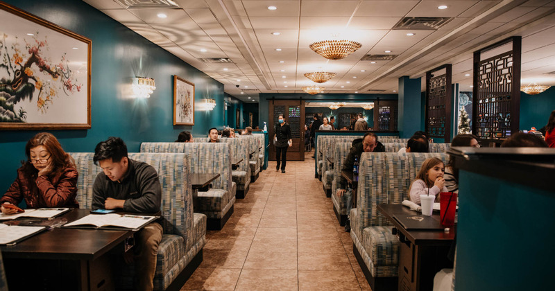 Interior, guests ordering and eating food