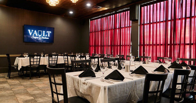 Interior, tables and chairs in dining area