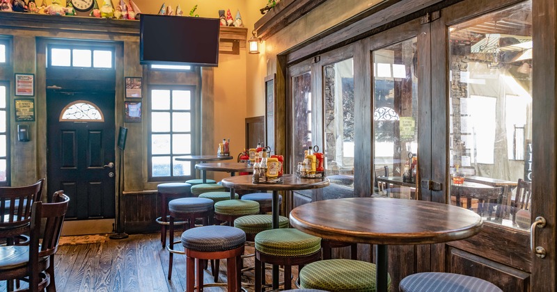 Rustic and cozy pub interior seating area