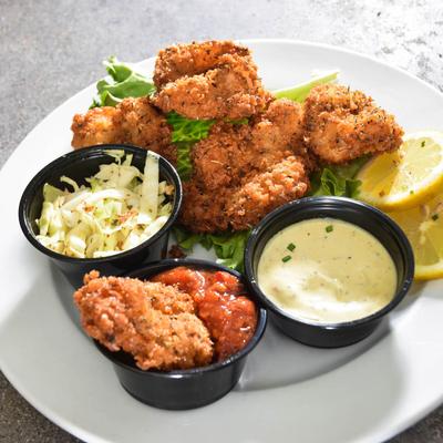 Jumbo fried shrimp with house-made cocktail sauce and house-made coleslaw.