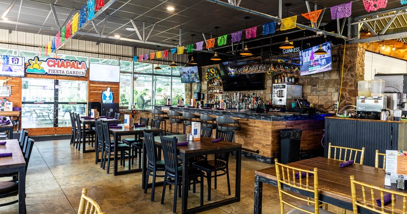 Interior seating area with chairs and tables