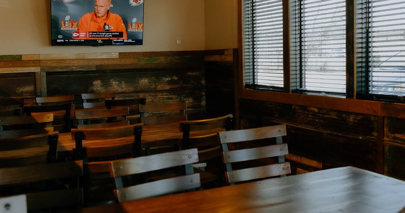 Interior, tables and chairs ready for guests
