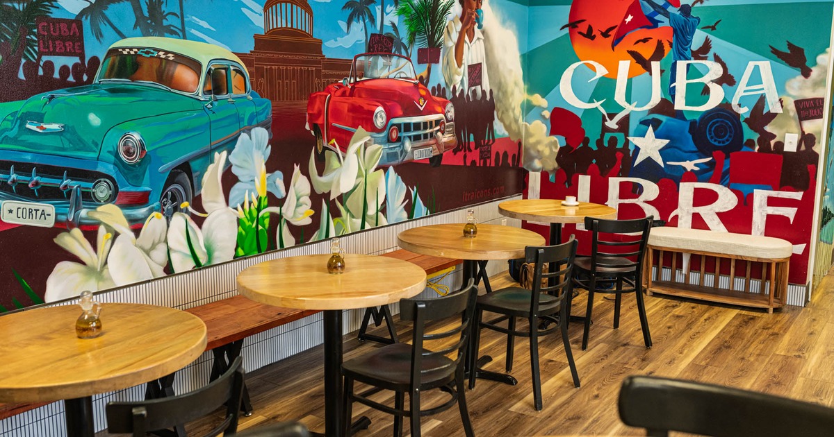 Inside seating and dining space, colorful walls