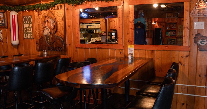 Interior, high tables and chairs ready for guests