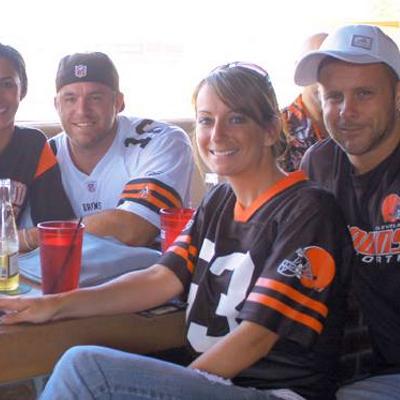 Two couples posing for a photo