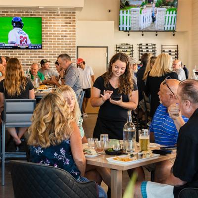 Employee tending to customers.