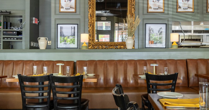 Dining area, banquette seating with tables and chairs