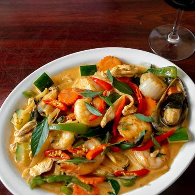 Grilled scallops, shrimp, and green shell mussels, with sauteed veggies.