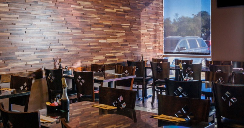 Interior, dining area with tables an chairs