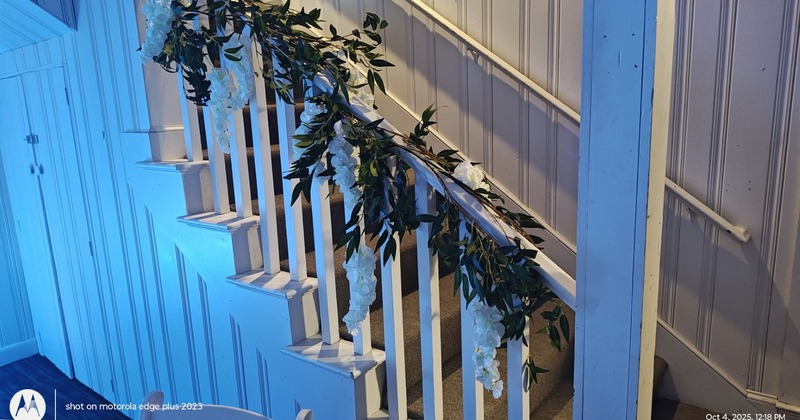 A bright interior - wooden tables and chairs and large windows