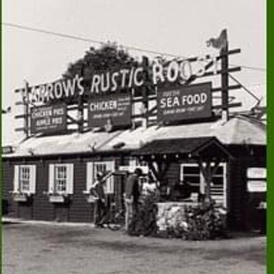 Vintage picture of Harrow's Rustic Roost, with signs for chicken, pies, and seafood.