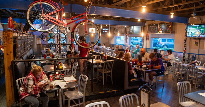 Interior, dining area full of guests