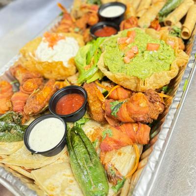 A plater of assorted Mexican food.