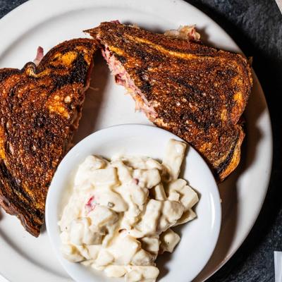 Reuben with potato salad.