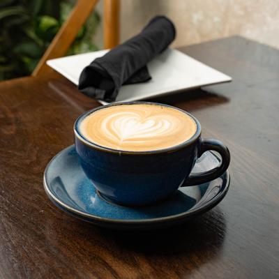 A cup of latte with art.