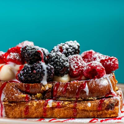 Close up of a berry topped French toast.