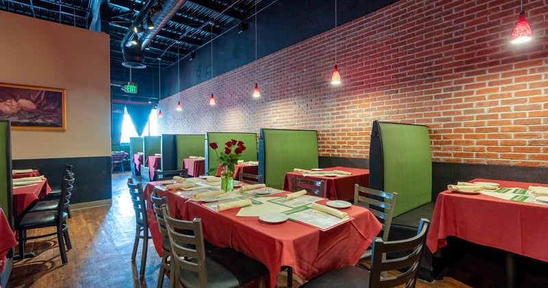 Interior, dining area, tables ready for guests