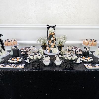 Table with assorted desserts.