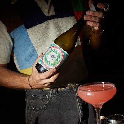 Bitter French cocktail, and a bottle of white wine.