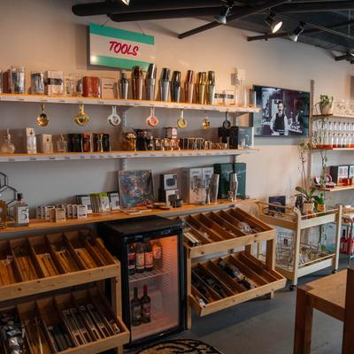 Various bottles and cocktail making tools.