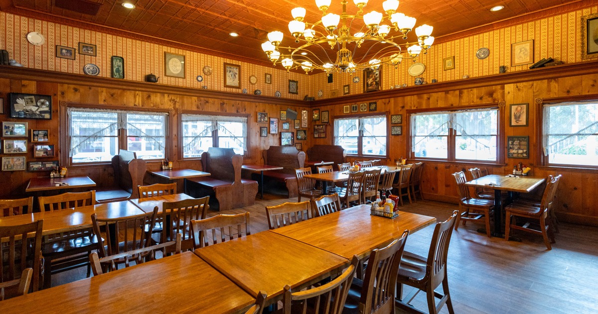 Inside, seating area with tables and chairs