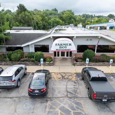 The restaurant building and the parking lot in front.