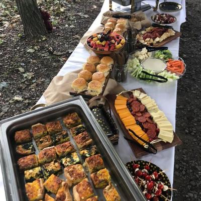 Buffet-style catering setup for an outdoor event.