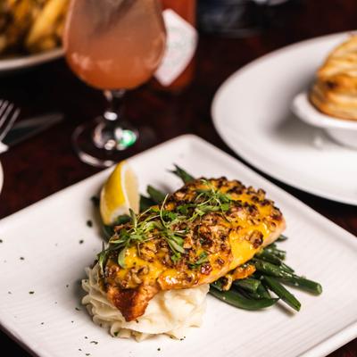 Irish sausage with mashed potatoes, green beans, and Guinness caramelized onion gravy.