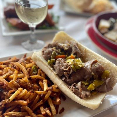 A sandwich with fries.