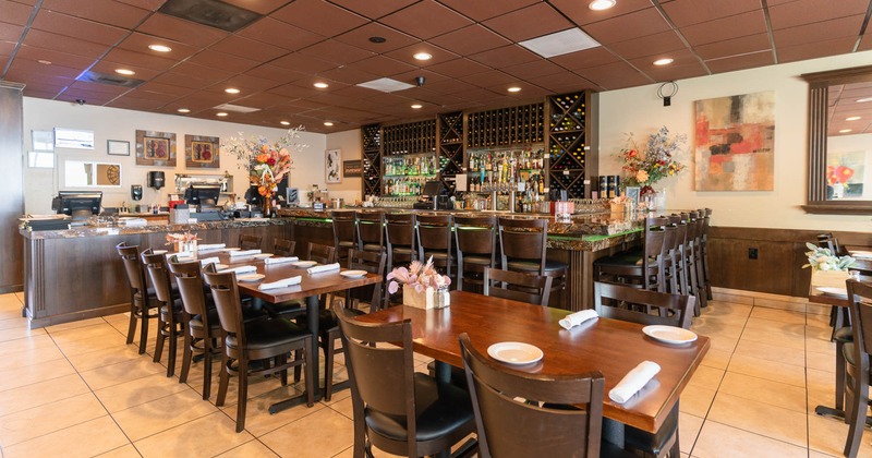 Interior, tables and chairs ready for guests