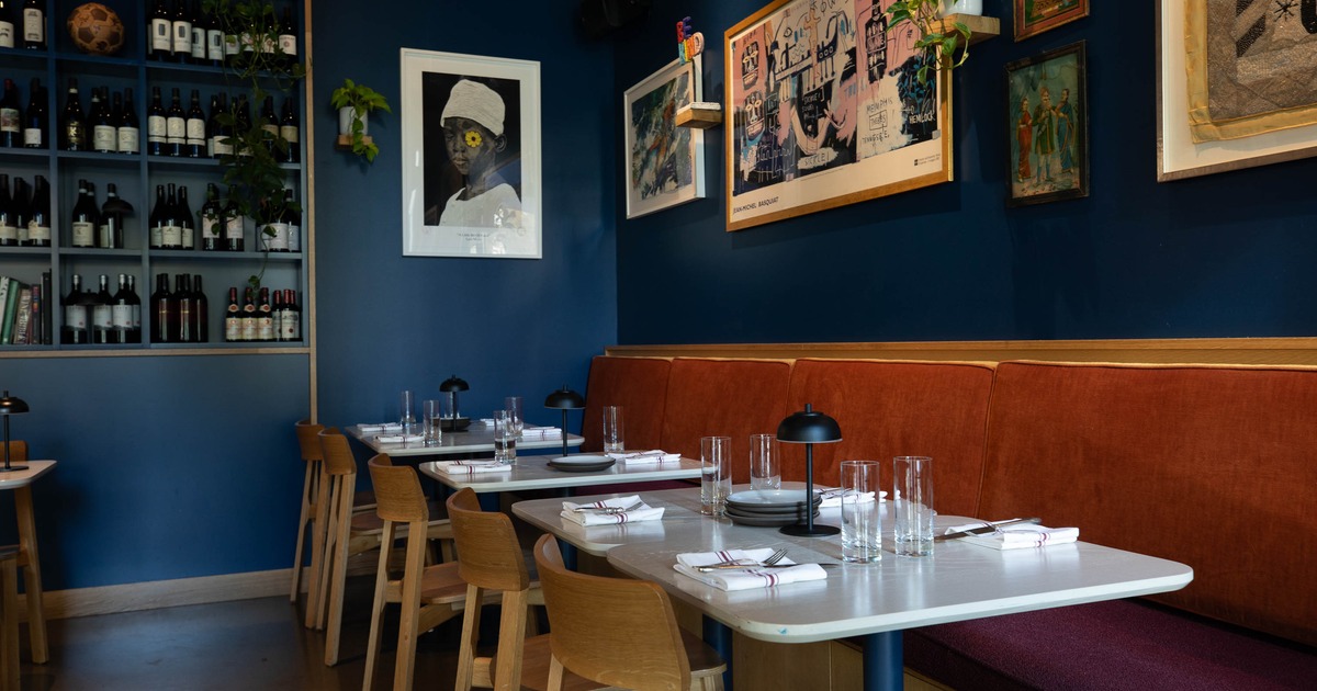 Interior, table set for guests in dining area