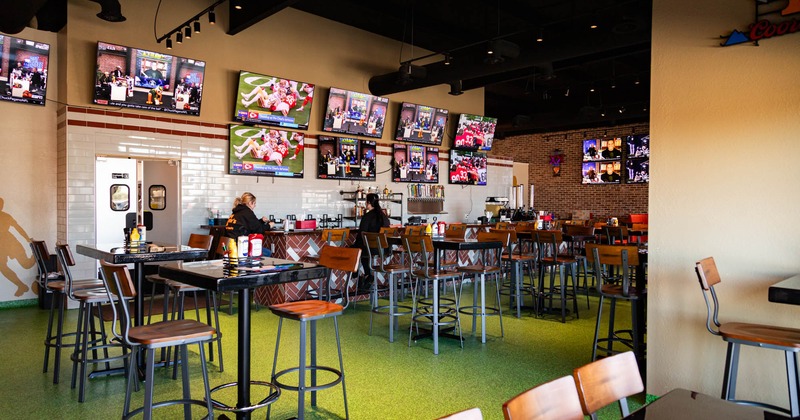 Interior, seating area with a bar in the back