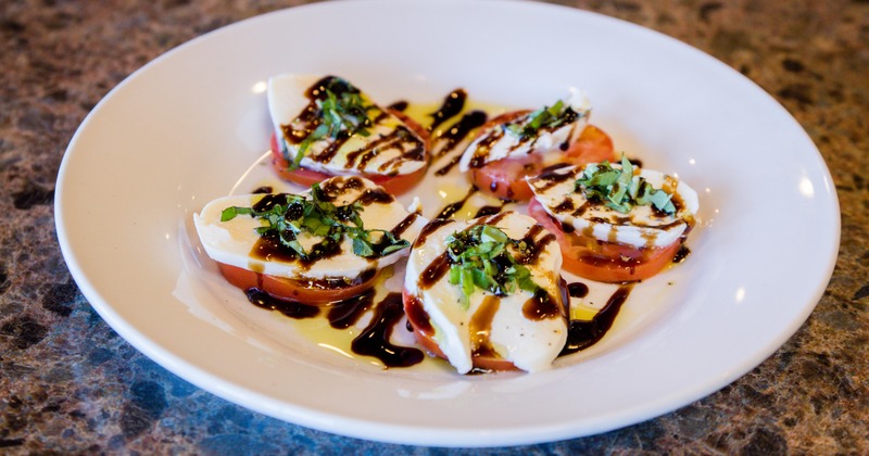 A plate of Caprese salad