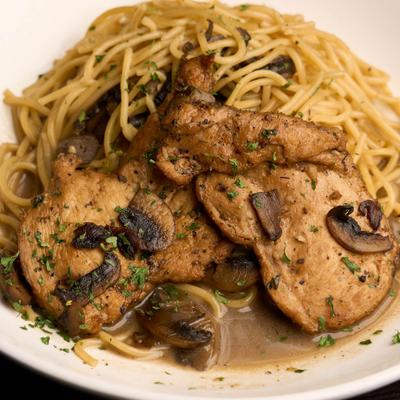Pan-seared chicken in a mushroom marsala wine sauce.