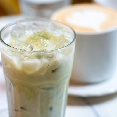 Iced matcha latte in a clear glass.