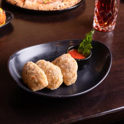 Fried and stuffed pizza dough.