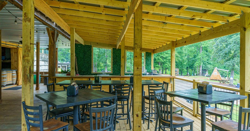 Outside, covered patio, wooden tables and chairs